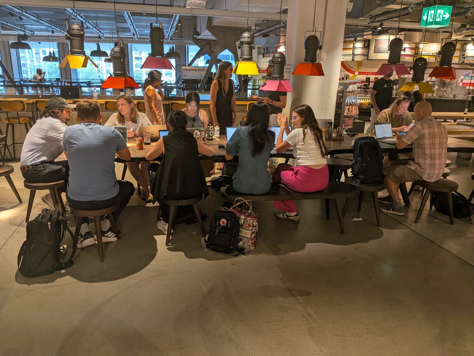 AI Jam participants building together around tables in Zürich on July 7, 2026